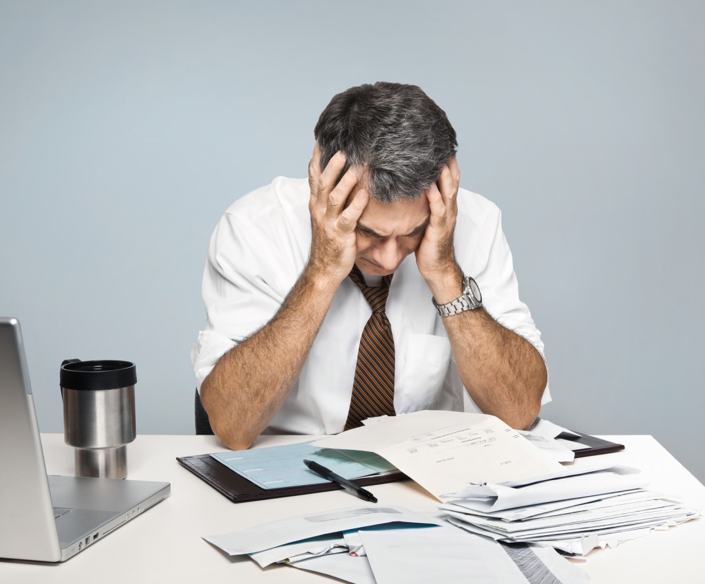 Stressed Man Worries About Economy, Paying Bills, Retirement