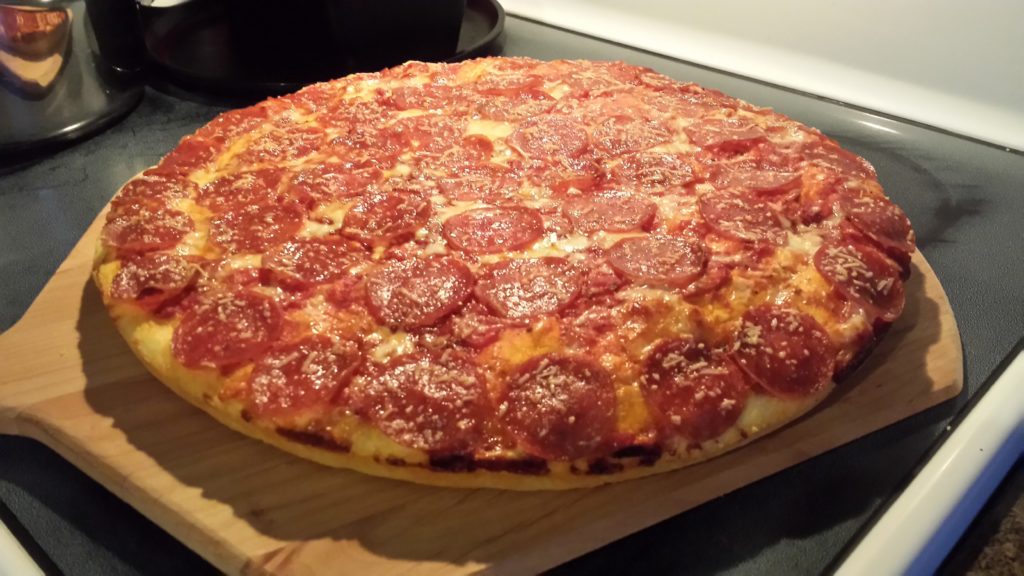 This version of homemade pan pizza has pepperoni toppings. If pepperoni is not your thing, then you can try something else like ground beef or bacon. 